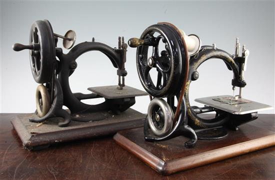 Two cased Wilcox & Gibbs sewing machines